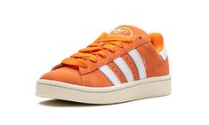 The adidas Campus 00s "Amber Tint" is a burnt orange colorway of the skate-inspired sneaker.  The Campus 00s is a retro shoe with a design inspired by “puffy” Y2K-era skate shoes.  This colorway features an Amber Tint suede construction with white contrast stitching.  Oversized white leather Three Stripes is seen on the sides.  “Campus” branding appears on the lateral side of the mid-panel next to the classic adidas logo detailing.  The brand’s signature Trefoil logo is located on the heel and o Orange Campus 00s, Adidas Shoes Campus, 2025 Wishlist, Adidas Campus 00s, Classic Adidas, Y2k Era, Black Converse, Adidas Campus, October 2