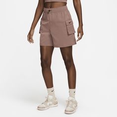 Made with a soft, smooth woven fabric and a roomy fit, these shorts deliver a comfortable, casual feel you can wear all day. Cargo pockets provide a utility look and secure small-item storage. Designed to sit at your belly button, they're a natural fit for your favorite cropped tops. Small Item Storage, Comfortable Style, Woman Weaving, Cropped Tops, Women Lifestyle, High Rise Shorts, Athletic Shorts, Belly Button, Comfortable Fashion