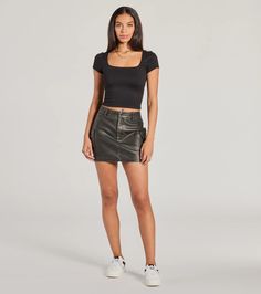 This cute and edgy faux leather mini skort features a flattering high-rise waist, form-hugging fit, and cargo side pockets that give this skort a functional flair. Fit & FeaturesFaux leather material, stretchy knit shorts liningHigh-rise waistSide flap pocketsFront snap-button and hidden zipper closureForm-hugging mini-length hemRuns true to size Fitted Faux Leather Mini Skirt Casual Style, Trendy Faux Leather Mini Skort, Black Leather Mini Bottoms, Fitted Black Faux Leather Skort, Trendy Leather Mini Skirt, Edgy High Waist Faux Leather Mini Skirt, Trendy Faux Leather Mini Bottoms, Trendy Fitted Leather Mini Skirt, Black Leather Mini Skirt Casual Style