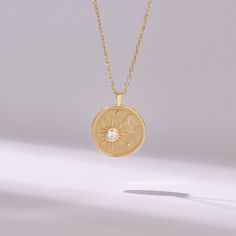 Elevate your style with our Unique Moon Necklace, meticulously crafted from 14k solid yellow gold. This handmade necklace exudes modern elegance and timeless sophistication. Perfect for everyday wear, it adds a touch of trendy flair to any ensemble, making it a must-have accessory for the modern woman.  𝐈𝐭𝐞𝐦 𝐃𝐞𝐭𝐚𝐢𝐥𝐬 * Gold KT: 14KT * Custom Gold Color:  Yellow Gold * Charm 17.35x14.70 mm * Charm Thickness: 1.05 mm 𝐆𝐞𝐦𝐬𝐭𝐨𝐧𝐞 𝐃𝐞𝐭𝐚𝐢𝐥𝐬 * Natural Diamond * Diamond Color-Clari Celestial 14k Gold Round Pendant Jewelry, 14k Gold Medallion Jewelry With Birthstone, 14k Gold Medallion With Birthstone Jewelry, 14k Gold Medallion With Birthstone, Everyday Gold Diamond Necklace With Accents, Elegant Round Engraved Diamond Necklace, Celestial Diamond Necklace Gift, Celestial Diamond Necklace For Gift, Celestial Style Gold-plated Yellow Gold Jewelry