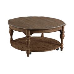 an oval wooden table with wheels on the bottom and one shelf below it, against a white background