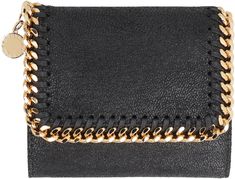 Indulge in the luxurious elegance of the Falabella Small Flap Wallet. Crafted with shaggy deer fabric, this exquisite piece features a snap closure and a stunning gold-tone ruthenium diamond cut chain trim. With six card slots, a bill compartment, and a convenient coin zip compartment, this wallet is as practical as it is stylish. The alter nappa and logoed jacquard fabric lining add a touch of sophistication to this timeless accessory, making it the perfect addition to your collection of luxury Deer Fabric, Stella Mccartney Falabella, Timeless Accessories, Jacquard Fabric, Artificial Leather, Diamond Cut, Brand You, Fabric Material, Stella Mccartney