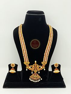 Original Design by Classical Dance Jewelry® -- Colorful And Designer Beautiful Necklace For Women.You Can Wear this Necklace Set In Parties, Engagement, Weddings, Birthdays And Many Occasion As You Like. -- Handmade Indian Item. This Beautiful Necklace Set Is Handcrafted In Copper Alloy Of Very Fine Quality With Imitation Pearls Of Very Fine Quality. -- Especially For Bharatnatyam And Kuchipudi Dance Performances. -- Earrings are optional for this set. PLEASE NOTE ❥ ALL SALES ARE FINAL ✅ ❥ No Re White Tikka As Gift In Temple Jewelry Style, Kundan Necklace With Peacock Design For Wedding And Festivals, Traditional Chandbali Mala For Celebrations, Temple Jewelry Style Bridal Necklace With Cutdana For Celebration, Temple Jewelry Bridal Necklace With Cutdana For Celebrations, Festive Chandbali Mala For Celebration, White Kundan Necklace For Puja, Temple Jewelry Style Mala With Cutdana For Celebration, Festive Celebration Chandbali Mala