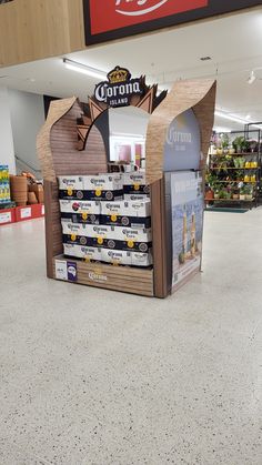 a display in the middle of a grocery store filled with boxes and snacks for sale