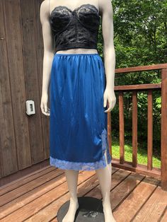 Please no orders to the USA for under $100 CAD due to Canada post strike! No orders outside Canada or the US at this time. Vintage slip skirt by French Maid. In great condition. Small slip up the side and has a lace trim. Tagged a medium but best for a small.  Fits S  26-30" waist  34" hips 26" length High-waist Blue Relaxed Skirt, Blue High Waist Relaxed Skirt, Blue Long Lined Skirt, Blue Relaxed Lined Pencil Skirt, Blue Relaxed Fit Lined Pencil Skirt, Blue Lined Midi Skirt, Blue Midi Pencil Skirt, Blue Relaxed-fit Midi Pencil Skirt, Blue Midi Skirt With Lining