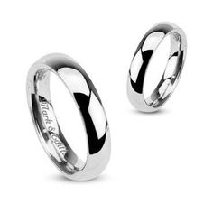 two wedding rings with the word love is forever engraved on them