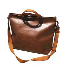 Material: PU Texture: Soft Closed: Zipper Size: 18.90"L x 5.51"W x 15.35"H in; It is enough to hold daily stuff including cell phones, sunglasses, wallet, key, etc. Baldric: Adjustable shoulder strap Casual Brown Laptop Bag With Large Capacity, Large Capacity Satchel Briefcase For On-the-go, Trendy Brown Laptop Bag For Daily Use, Brown Large Capacity Laptop Bag For On-the-go, Casual Business Faux Leather Shoulder Bag, Trendy Shoulder Laptop Bag With Zipper Closure, Faux Leather Laptop Bag For Everyday Use, Trendy Shoulder Laptop Bag With Zipper, Crossbody Travel Bag For Daily Use