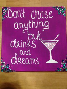 a purple sign that says don't chase anything but drinks and dreams on it