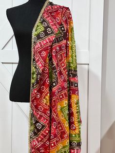 Experience the beauty of traditional Phulkari style with our Multicolor Dupatta. Made with a soft and luxurious silk finish, this dupatta features real mirror accents and stunning designs. Its heavy-weight construction makes it perfect for special occasions like Navaratri. Elevate your wardrobe with this must-have accessory. Approx 2.5 meters length Multicolor Dupatta, Short Kurtis, Dhoti Pants, End Of Season Sale, Accent Mirrors, New Instagram, Festival Wear, Heavy Weight, The Beauty