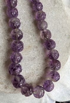 Beautiful Circa 1930s Old Chinese Carved Amethyst Shou Bead Vintage Necklace Beads are slightly graduated in size measures a little over 18 inches around weighs 77 grams of Gemstone Artisan Purple Beaded Necklace With Round Beads, Vintage Purple Round Beads Jewelry, Vintage Purple Round Bead Jewelry, Faceted Amethyst Beaded Necklace With Round Beads, Faceted Amethyst Beaded Necklaces, Usa Jewelry, Necklace Beads, Handcrafted Necklace, Amethyst Beads