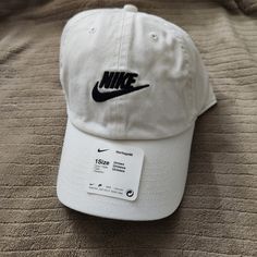 Sportswear Heritage 86 Unisex White Cap/Hat From Nike New, Never Worn One Size Casual Cotton Hats With Logo Print, Casual Cap With Logo Print, Sporty Hats With Letter Print For Spring, Sporty Letter Print Hats For Spring, Sporty Spring Hat With Letter Print, Casual Cotton Sports Baseball Cap, Nike Cotton Baseball Cap, Nike Casual Baseball Cap With Curved Bill, Nike Sporty Baseball Cap For Sports