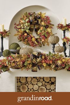 a fireplace mantle with wreaths and candles on it, surrounded by fall leaves and other decorations