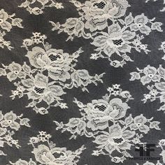 This gorgeous Chantilly lace is white in color. Unique for the the embroidery that sits on quite an open tulle and floral/scalloped border, this Chantilly lace is a popular choice for adding a feminine touch to any look - dresses, veils, slips and garment accents.Ideal for bridal, this French lace will take any design from ordinary to elegant. This fabric is sheer, therefore a lining is needed if additional structure and modesty is desired. SKU: 6889 Content: Nylon Blend Color: White Width: 36 i Elegant White Scalloped Lace, White Elegant Tulle Fabric With Lace Trim, Elegant White Tulle Fabric With Lace Trim, Fitted White Tulle Fabric With Lace Trim, Elegant White Lace With Contrast Detailing, Cream Tulle Fabric With Lace Trim, Cream Lace Tulle Fabric With Lace Trim, Delicate White Lace With Lace Trim, Elegant Lace Fabric With Lace Trim