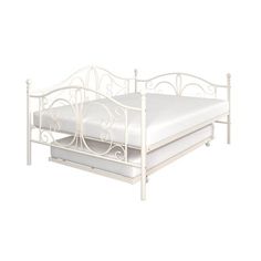 a white metal bed frame with two mattresses