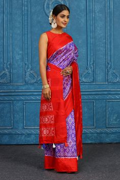 Alluring purple Pochampally ikkat silk saree with red border is a perfect drape for parties and festive occasions. It comes with a matching blouse piece. Disclaimer: The shown stitched blouse on the model is for display purpose only. The saree comes with a matching blouse piece and finished with fall and piko. Purple And Pink Border Sarees, Semi-stitched Purple Saree, Purple Katan Silk Pre-draped Saree For Puja, Purple Semi-stitched Dola Silk Saree, Purple Semi-stitched Cotton Silk Pre-draped Saree, Latest Designer Sarees, Fashion Journals, Kanchipuram Saree, Tussar Silk Saree