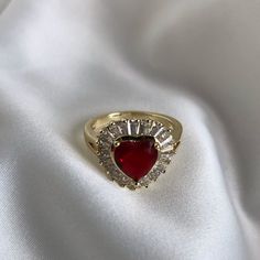 18k Gold-Filled Red Heart Cubic Zirconia Woman’s Ring. Height: 1/2in=12.7mm Width: 9/16in=14.3mm Size: 7 Women’s Sweat & Water Resistant,Lead Free,Nickel Free,Hypoallergenic,No Tarnishing,Best Quality. Make Your First Purchase At Poshmark And Receive $10 When You Join With My Code: Virysilva Ruby Heart Ring, Ruby Heart, Cubic Zirconia Rings, Womens Jewelry Rings, Red Heart, Red Gold, Heart Ring, Gold Filled, Cubic Zirconia