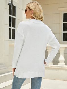 Upgrade your wardrobe in the Cold Day Glam Chenille Pullover Sweater in snow white that features a classic V neckline. Size Guide: Demi is 5’6” tall, and has a 33.5” bust, 24.8”waist, & 37.4” hips. She is wearing a S / US 4 / AU 8. This sweater is true to size. Material: 100% polyester. Key Features: Relaxed fit. Long sleeve. Glam material. Care Instructions: Machine wash / Cold hand wash White V-neck Sweater For Layering, White V-neck Outerwear For Layering, White Knit Turtleneck Outerwear, White Crew Neck Cardigan For Fall, White Knit V-neck Sweater For Layering, White Solid Color Sweater For Fall, White Solid Color Fall Sweater, White V-neck Layering Outerwear, White Crew Neck Outerwear For Layering