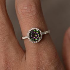 This is a gorgeous handmade creation. Its beauty is its simplicity & Elegance. The 7mm round cut mystic topaz is crafted in solid sterling silver and with rhodium plated. All item is sent in a beautiful gift box You can realize more lovely stuff clicking the link https://www.etsy.com/shop/knightjewelry?refshopsection_shophome_leftnav Please leave the correct address and you phone number for delivering successfully. White Topaz Round Birthstone Ring, May Birthstone Round Halo Ring, Round May Birthstone Halo Ring, Round Halo Ring With May Birthstone Gemstone, White Topaz Birthstone Ring, Dazzling Sterling Silver Topaz Ring, Sterling Silver Birthstone Ring With Halo Setting, Dazzling Sterling Silver Halo Ring, Dazzling Sterling Silver Crystal Ring