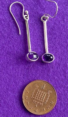 Here are a beautiful pair of modernist style silver dangle drop earrings. They measure 4cm in length and weigh 2.3 grams which makes them not at all heavy on the ears. Purple Long Drop Earrings With Ear Wire, Modern Purple Sterling Silver Earrings, Purple Modern Sterling Silver Earrings, Purple Sterling Silver Long Drop Earrings, Long Drop Purple Sterling Silver Earrings, Long Drop Amethyst Earrings In Purple, Purple Amethyst Long Drop Earrings, Nickel Free Amethyst Long Drop Earrings, Purple Sterling Silver Drop Earrings