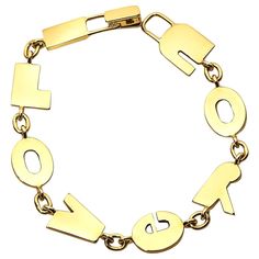 Saying "I love you" is sometimes just enough, and this 18 karat yellow gold bracelet does just that. 7.25" in length. Fox Jewelry, Gold Link Bracelet, Dope Jewelry, Gold Charm Bracelet, Stacked Jewelry, Jewelry Lookbook, Funky Jewelry, Yellow Gold Bracelet, Jewelry Inspo