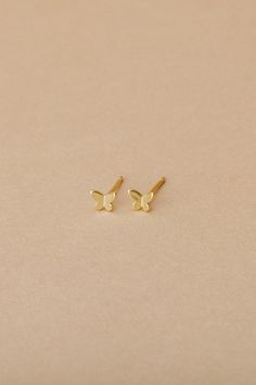 Mariposa is our tiny gold vermeil butterfly stud, the only thing better than flowers is butterflies. We love to wear our Mariposa solo or layer with a hoop. - 3D gold vermeil butterfly stud detail with butterfly closure - .5mm width, 4mm length, 1mm thick - Nickel free - Hypoallergenic Dainty Gold Butterfly Jewelry, Everyday Gold Butterfly-shaped Jewelry, Minimalist Yellow Gold Butterfly Jewelry, Hypoallergenic Yellow Gold Butterfly Jewelry, Hypoallergenic Butterfly-shaped Yellow Gold Jewelry, Hypoallergenic Butterfly Yellow Gold Jewelry, 14k Gold Butterfly Earrings With Butterfly Charm, 14k Gold Butterfly Charm Earrings, Dainty Yellow Gold Butterfly Earrings