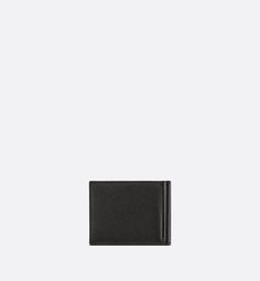 The wallet is a compact accessory with a refined look. Crafted in black grained calfskin, it showcases a ruthenium-finish brass CD Icon signature on the front. The tonal smooth calfskin interior features six card slots and a money clip. The bifold wallet will slip into pockets and bags with ease.. Luxury Leather Wallet With Grained Texture, Luxury Wallets With Grained Texture For Formal Occasions, Formal Leather Wallet With Grained Texture, Elegant Leather Wallet With Grained Texture, Leather Bifold Card Holder For Evening, Luxury Black Trifold Wallet For Formal Occasions, Elegant Smooth Grain Leather Card Holder For Formal Use, Elegant Smooth Grain Card Holder, Elegant Formal Card Holder With Smooth Grain