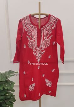 Description ▪ Kurti Fabric: Cotton ▪ Sleeves: 3/4 Sleeves ▪ Kurti Length: 30-32 inches ▪ Occasions: Casual Wear, Office Wear, Festive Wear ▪ Garment Care: Hand Wash Only ▪ Item Content: 1x Kurti Disclaimer: Embroidery may be little vary due to various human hand involvement. Delicate Chikan hand embroidery on the cotton fabric. This kurti is the epitome of class and beauty. Tailored in straight fit; the kurta features pretty 'Jaal' pattern embroidery on the whole front,  Disclaimer : Motifs of e Sleeves Kurti, Short Kurti, Festive Wear, Cotton Gifts, Ethnic Wear, Office Wear, Festival Wear, Top Casual, Indian Dresses