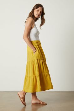 An essential if ever there was one. Crafted from our signature cotton gauze, this midi-to-maxi skirt can quite literally be styled to go anywhere–from work to vacation–with its easy tiers, elastic waist and always-essential in-seam pockets. Breezy Tiered Maxi Skirt, Breezy Ruffled Tiered Maxi Skirt, Breezy Tiered Maxi Skirt With Ruffles, Breezy Tiered Ruffle Maxi Skirt, Chic Tiered Maxi Skirt For Summer, Breezy Tiered Maxi Skirt For Summer, Tiered Maxi Skirt For Summer Day Out, Breezy Tiered Flowy Maxi Skirt, Breezy Tiered Lined Maxi Skirt