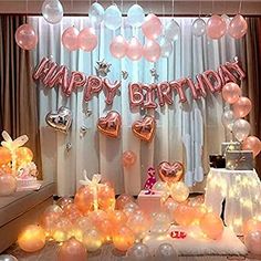 a birthday party with balloons and decorations