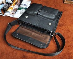 This is a vintage crossbody messenger bag. It's quite handy for daily use and trips. It can hold all of your necessities for your everyday use, wallet, phone, passport, sunglasses, credit card, earphones, keys, Kindle, and miscellaneous items.  
 
   Versatile, functional and durable, this Leather Messenger Shoulder bag provides protection, peace-of-mind, security and organization, which is a best choice for travel and everyday needs.   
 ITEM FEATURES  
 
  
 - 2 x Front Pockets  
 - 1 x Main Classic Black Portable Shoulder Bag, Everyday Carry Crossbody Shoulder Bag, Vintage Mobile Phone Bag For Business, Casual Portable Shoulder Bag For Everyday Carry, Portable Rectangular Bag For Everyday Carry, Daily Use Shoulder Satchel, Classic Shoulder Bag With Cell Phone Pocket For Travel, Classic Travel Shoulder Bag With Cell Phone Pocket, Casual Business Satchel With Cell Phone Pocket