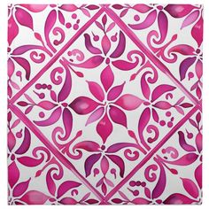 a pink and white tile with an intricate design