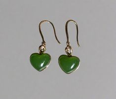 AA Bright Green Siberian Nephrite Jade Heart Earrings, set in 18k Gold Jade measures approximately 8x10mm Elegant Green Heart Cut Earrings, Classic Green Heart-shaped Jewelry, Formal Green Heart-shaped Earrings, Heart-shaped Green Jewelry With Matching Earrings, Green Heart Sterling Silver Earrings, Elegant Green Heart Earrings For Gift, Elegant Heart-shaped Jade Jewelry, Green Heart-shaped Earrings For Anniversary, Green Heart-shaped Jewelry For Formal Occasions