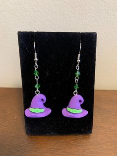 These earrings were handmade using brass and rhodium (without nickel) findings, beads, and hat charms. Witchs Hat, Hat Charms, Witch Hat, Jewelry Earrings Dangle, Dangle Drop Earrings, Witch, Dangle Earrings, Jewelry Earrings, Charms