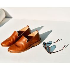 Super-comfortable slip-on shoes, handcrafted in a 6th-generation Italian workshop Slip-on Moccasins For Formal Events, Loafers For Galas With Stitched Sole And Flat Heel, Flat Heel Loafers With Stitched Sole For Galas, Stitched Sole Slip-on Loafers For Galas, Slip-on Loafers With Stitched Sole For Galas, Slip-on Leather Shoes With Rubber Sole For Galas, Modern Slip-on Moccasins With Leather Lining, Slip-on Loafers With Plain Toe For Galas, Classic Summer Oxfords With Rubber Sole