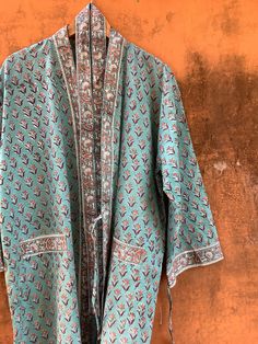 "SALE-  BUY 1 AVAIL 10% OFF, BUY 2 OR MORE AVAIL -20% off . ,please note our processing time is 1-2 weeks due to high demand and all the dresses are made to measure as per your height and size. ALL DRESSES ARE CUSTOM-MADE - ONLY FOR YOU! FRESH FABRIC AND FRESH STITCHINGS! . ..Indian Block Print / tie- dyed kaftans robe- made to measure- all customizations happily accepted! Indian Handblock print Cotton Kimono Robe, Floral Dressing Gown,Cotton Robes, Floral Kimono Jacket, Lounge wear, Beach Kimono ,Beach Dress ,Beach Cover ups, Lounge wear...quite versatile!! Beautiful Teal Floral Hand Block Print Handmade ROBE with floral paisley accent on borders, sleeves, pockets and belt. I have made this beautiful dress in Indian hand block print and ultrasoft premium cotton  which is breathable and fr Floral Gown Dress, Robes For Women, Kimono Floral, Beach Kimono, Kimono Robes, Beach Cover Ups, Indian Block Print, Cotton Kimono, Floral Kimono