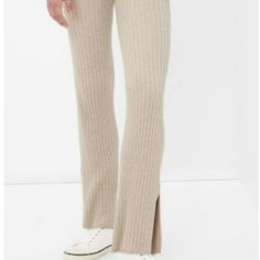 Mid-Rise. Slim Through The Hip And Thigh, Flares From Knee To Leg Opening. Nwt Gap Casual Beige Pants, Casual Beige Gap Pants, Gap Straight Leg Loungewear Bottoms, Gap Mid-rise Pants For Fall, High Waist Ribbed Beige Bottoms, High Waist Beige Ribbed Bottoms, Gap Beige Casual Bottoms, Gap Long Lounge Bottoms, Gap Spring Pants