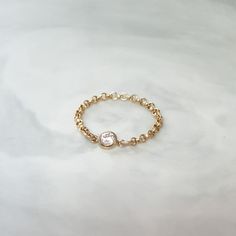 Simple. Chic. Minimalist™ A perfectly dainty CZ diamond chain ring, made with top quality 14K Gold filled and Cubic Zirconia stone. Ring sizes are in US All parts are made with 14k Gold filled and will last a lifetime! Also available with Sterling silver or 14K Rose gold filled. Model is wearing 6.5US size Please visit this link to see more of my stacking rings collection: https://www.etsy.com/shop/miniLALI?section_id=15703796&ref=shopsection_leftnav_6 My shop: https://www.etsy.com/shop/mini Yellow Gold Stackable Midi Rings With Cubic Zirconia, Stackable Yellow Gold Midi Rings With Cubic Zirconia, Stackable Cubic Zirconia Midi Rings In Yellow Gold, Everyday Diamond Stackable Midi Rings, Everyday Stackable Diamond Midi Rings, Dainty Rose Gold Cubic Zirconia Midi Rings, Dainty Cubic Zirconia Stackable Rings, Dainty Stackable Cubic Zirconia Diamond Ring, Gold Stackable Midi Rings With Cubic Zirconia