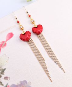 Vogue Red 14K Gold Cinnabar Ruyi Tassel Drop EarringsMade of fine 14K Gold Cinnabar Ruyi Tassel.Measurement: 12cm/4.68" * 1.8cm/0.702". Matches easily with daily hairstyle, dresses & Shirts Traditional Red Jewelry With Tassels, Red Tasseled Jewelry As A Gift, Red Tasseled Jewelry For Gift, Red Tassel Earrings For Gift, Red Dangle Tassel Earrings As Gift, Red Dangle Tassel Earrings For Gift, Elegant Festive Jewelry For New Year, Red Tassel Earrings With Latkans As Gift, Red Tassel Drop Earrings Gift