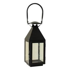 an old fashioned black lantern with a light on the front and side, against a white background