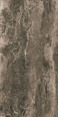 an abstract marble pattern in brown and grey tones, with white streaks on the surface