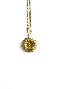 Daisy flower necklace, perfect for nature lovers and for a boho style. Available in brass or gold plated.  You can wear it alone otherwise looks stunning with other necklaces! The pendant comes with a chain like the first photo!   Leave a note before the purchase for the chain length, you can choose between 45 cm to 60 cm! The metal has been polished for durability in time and use! The same comes also in sterling silver like the last photo, check it here: https://www.etsy.com/listing/188450078/s Unique Gold Pendant Charm Necklace, Bohemian Necklace With Flower Pendant, Gold Pendant Charm Necklace, Bohemian Flower Charm Pendant Necklace, Bohemian Necklace With Flower Pendant As Gift, Bohemian Jewelry With Flower Pendant And Adjustable Chain, Tarnish Resistant Flower Pendant Necklace For Her, Bohemian Flower Pendant Necklace As Gift, Spiritual Gold-plated Flower Pendant Necklace