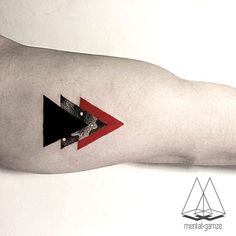 an arm with two black and red arrows on the left side of it, one arrow is