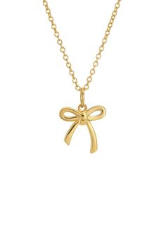 A charming, slim bow charm (12 mm) adds a touch of sweetness to this 14K gold plated brass adjustable necklace. 14K Gold plated brass. 16-18" length. Slim bow charm. Gold Necklace With Ribbon For Gift, Gold Necklace With Ribbon Perfect For Gifts, Dainty Gold Jewelry With Ribbon, Gold Bow Necklaces For Gifts, Gold Necklaces With Bow For Gifts, Gold Necklaces With Bow As Gifts, Gold Necklace With Bow For Gifts, Gold Necklace With Bow As Gift, Cute Necklaces Gold