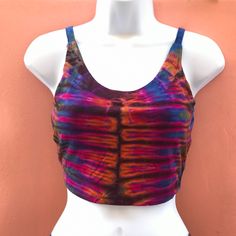 -95% rayon & 5% spandex -Fits bust Size 34-40 inches. -Made in thailand Matching spandex shorts available. Visit our shop at https://www.etsy.com/listing/520947586/tie-dye-spandex-shorts-festival-shorts?ref=shop_home_active_8&frs=1 Stretch Multicolor Crop Top For Music Festival, Summer Triangle Yoga Crop Top, Triangle Crop Top For Yoga In Summer, Triangle Top Crop Top For Yoga In Summer, Bra-friendly Sleeveless Festival Top, Bohemian Stretch Triangle Crop Top, Bohemian Stretch Crop Top With Triangle Shape, Bohemian Crop Top With Built-in Bra For Festivals, Summer Multicolor Crop Top With Built-in Bra