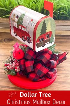 a red mailbox with a christmas tree on it and the words dollar tree diy christmas mailbox decor