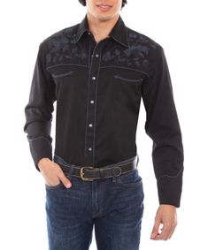 Lansky Bros. Clothier to the King- Black Roses Rockabilly Authentic Western Shirt. Black, Long-Sleeve Sport Shirt features black pearl snap buttons at center button placket and yoke, large pick stitch detailing all over, and beautiful silver-tone floral embroidery inspired by Rockabilly music. **Please note: We maintain full stock on our website, and in the event an item is out of stock, we will promptly order it for you and notify you via email. See Sizing Chart Flare Jeans Shoes, Rockabilly Music, Rockabilly Shirts, King Black, Pick Stitch, Maxi Jumpsuit, Black Roses, Sport Shirt, Retro Shirts