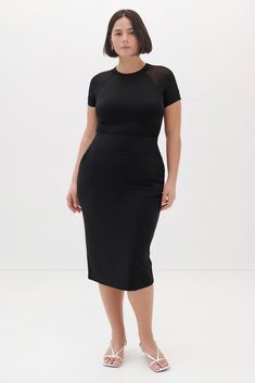 Meet sophistication. The Vesey Pencil Skirt is our modern update of a classic silhouette. She features a waist-flattering high rise and extra-wide waistband, plus two side pockets at the hips to create a sophisticated long black fitted skirt. Crafted from our beloved European ponte, Vesey is wrinkle-resistant with a crisp look and a touch of stretch, so you'll look polished in this tall pencil skirt until the end of the day—and into the night. | Astrid is 5'9" (175 cm) tall, wearing size XS. Maya is 5'7" (170 cm) tall, wearing size L. Total length from below the waistband is approximately 26" (66 cm). Waistband is approximately 3" (8 cm) wide. European Ponte, also known as Punto di Roma (60% Viscose 30% Polyamide 10% Lycra). Dry clean, or hand wash in cold water and lay flat to dry. Design Black Fitted Skirt, Black Minimalist, Into The Night, Pencil Skirt Black, Winter Clothing, Fitted Skirt, Classic Silhouette, Wide Waistband, Long Black