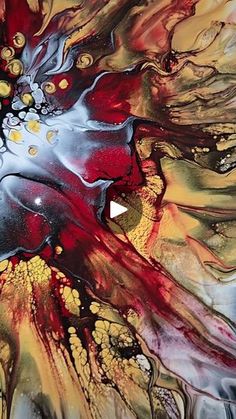 an abstract painting with red, yellow and black colors