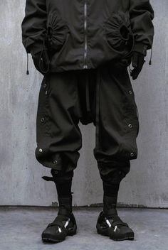 Niepce Black Techwear Pants Relaxed Fit Cyberpunk Streetwear Fashion Trousers Cheap Techwear Pants With Multiple Pockets, Black Cyberpunk Cargo Pants For Streetwear, Cyberpunk Cargo Pants For Streetwear, Gothic Fitted Bottoms With Rivets, Fitted Gothic Bottoms With Rivets, Cyberpunk Streetwear Bottoms With Cargo Pockets, Cyberpunk Cargo Bottoms For Streetwear, Techwear Harem Pants With Pockets For Streetwear, Techwear Style Harem Pants For Streetwear With Pockets