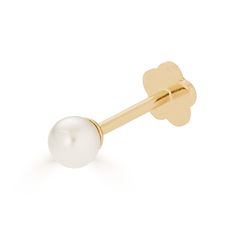 a pair of gold and white pearl studs on a white background - product image